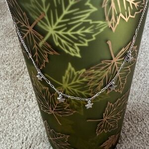 James Avery 16 inch dangling stars necklace with lobster claw clasp.